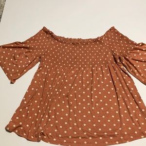 Cute polka dotted off the shoulder top.